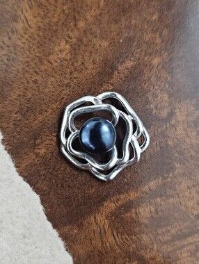 Silver Floral Pendant with Dark Blue Pearl Accent